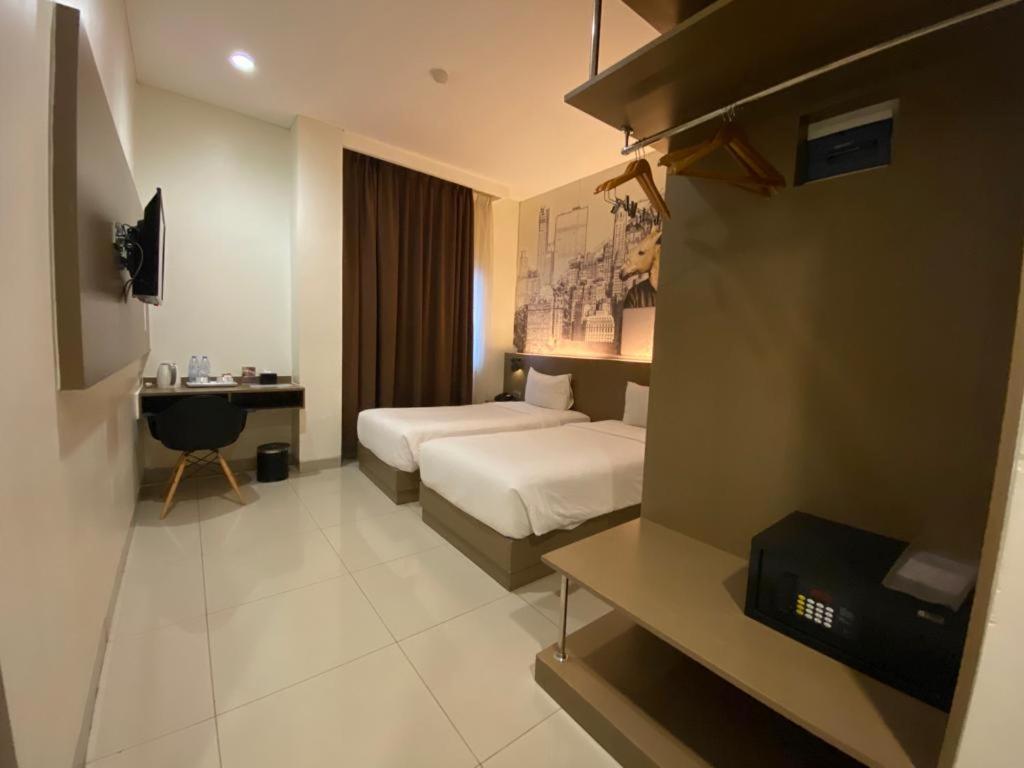 Opi Indah Hotel Palembang Eksteriør billede